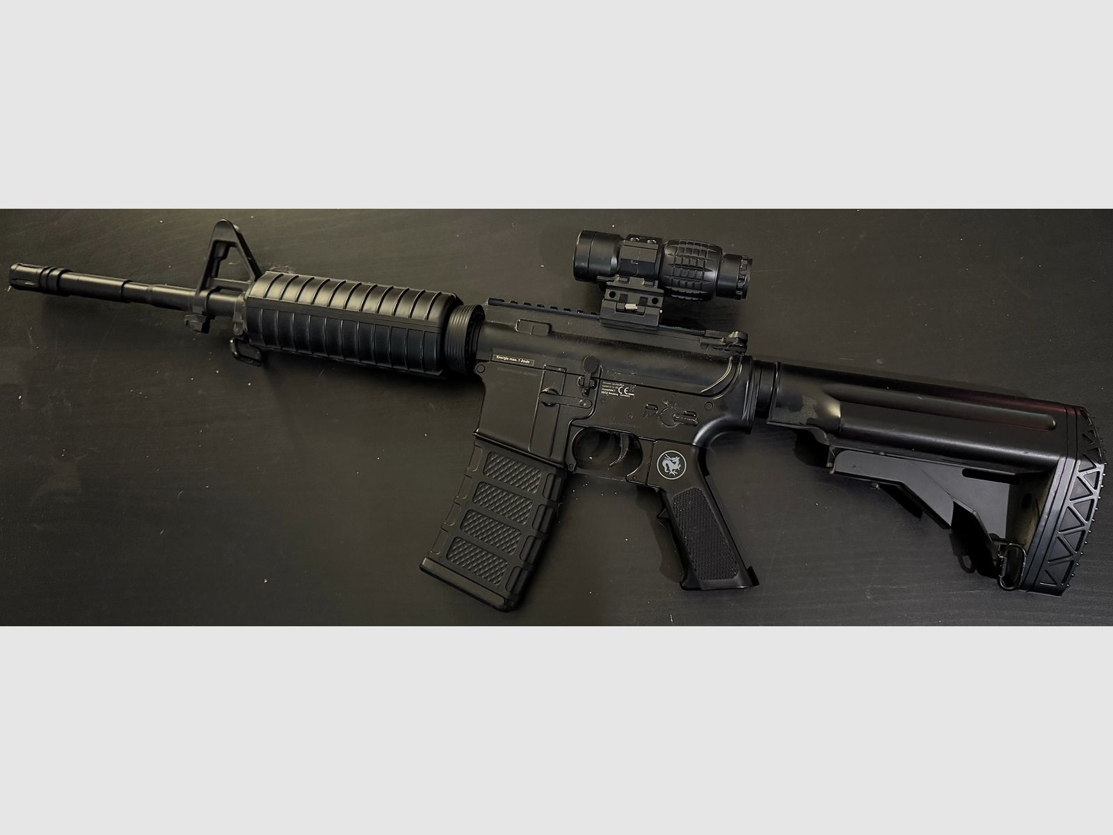 For sale is a high-quality AR-15 model, a typical M4 from a well-known manufacturer.