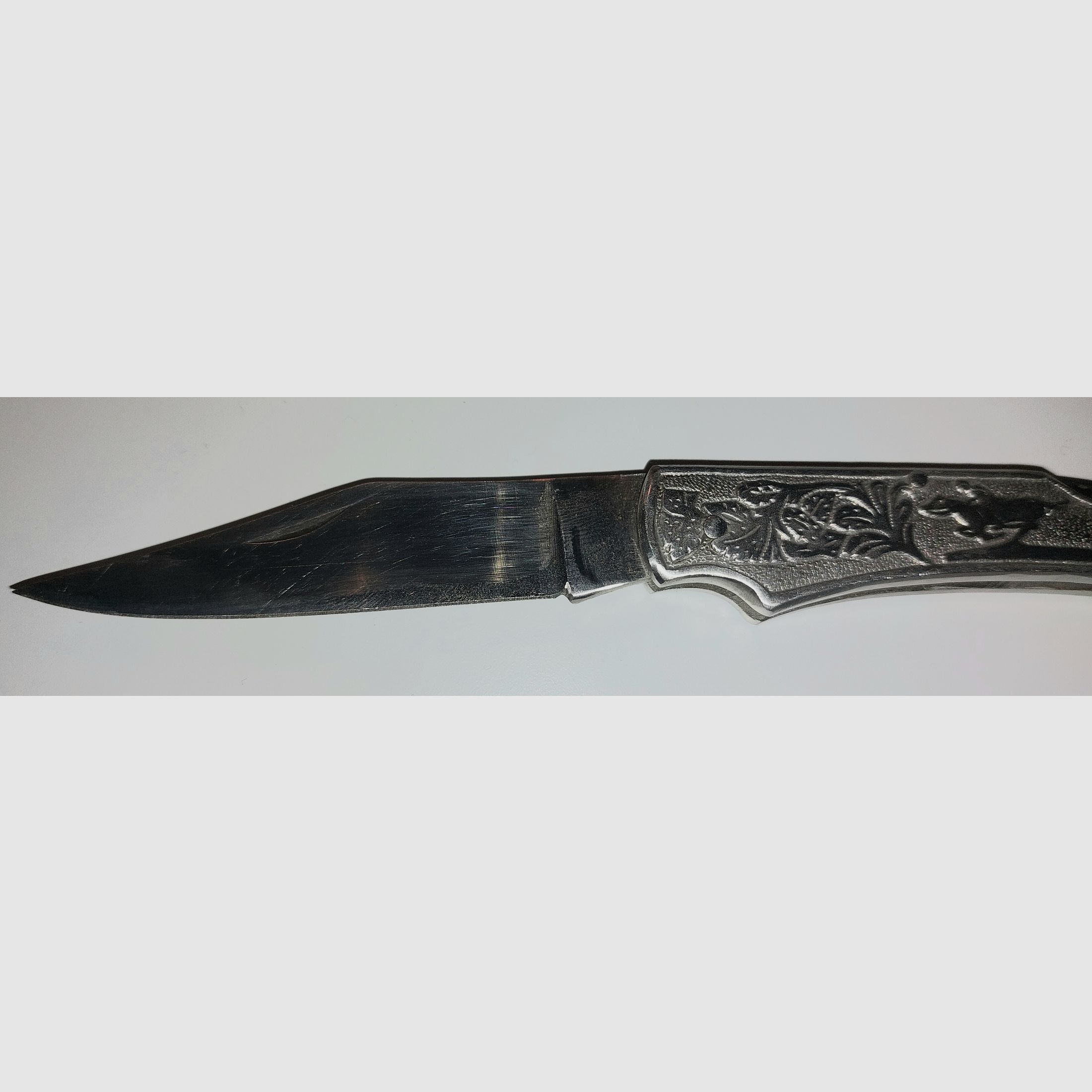 Pocket knife with rider motif, price negotiable