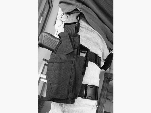 Holster de jambe universel incluant l'ENVOI