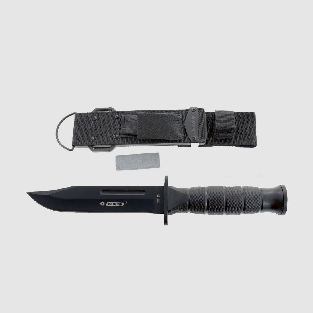 Couteau tactique Kandar avec lame clip point et affûteur