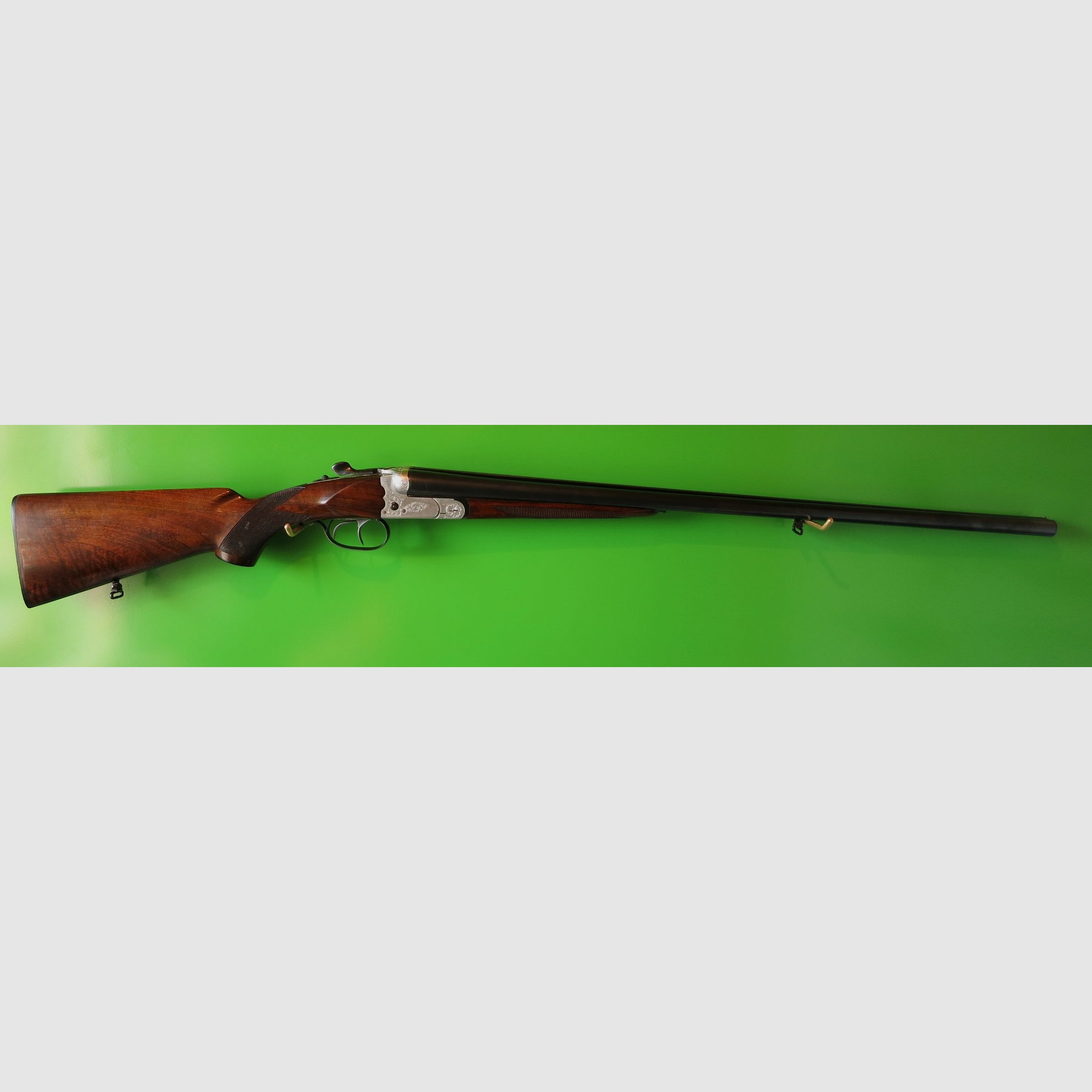 AyA, Aguirre and Aranzabal, Model 107 "Milan" double shotgun/cross shotgun caliber 16/70, engraving #20-