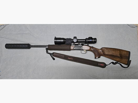 Merkel K5 Extrem with ZEISS V8 1.8-14x50 riflescope with rail and VANWARD Hunter PRO, overbarrel titanium suppressor for caliber .30