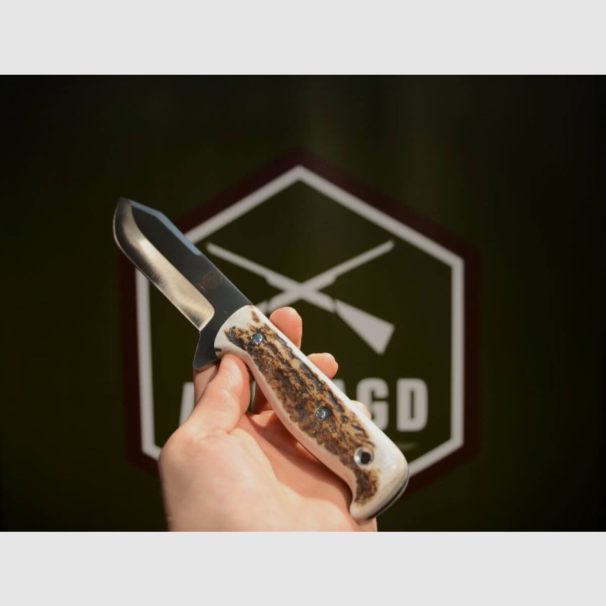 Hunting knife with stag horn handle