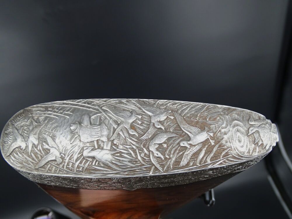 Drilling Franz Sodia gold inlays engravings fish skin collection dissolution