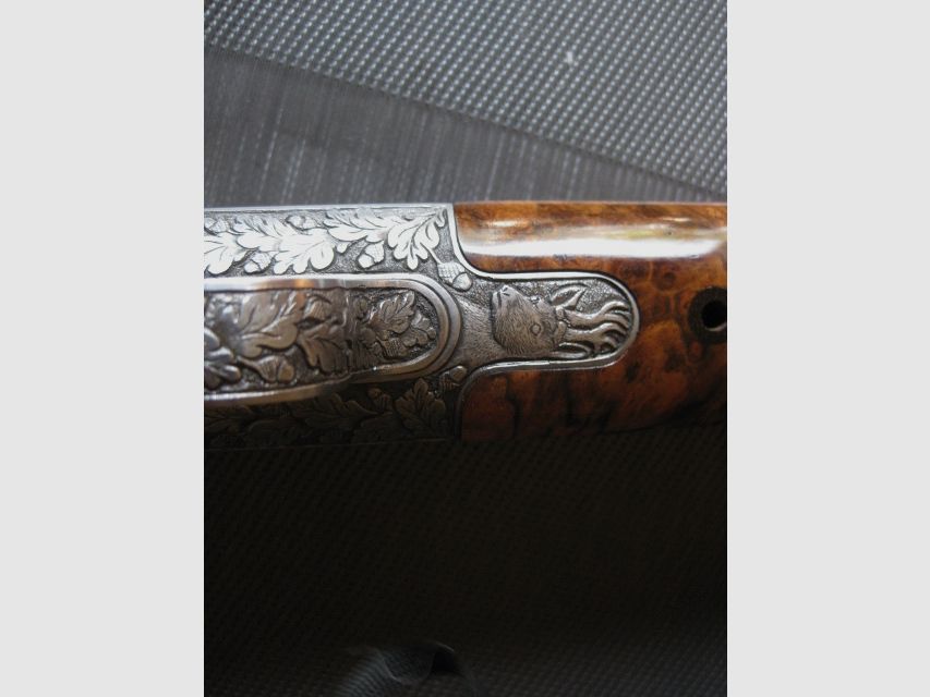 Absolutely UNIQUE COLLECTOR'S ITEM = Almost like new "Custom STEEL SYSTEM completion" with HAND-MODELED FULL ENGRAVINGS for R93, with custom-made right-handed semiweight stock and Category-11!! System is still one WITHOUT serial number!! Includes Blaser leather rifle sling!, image 11 of 17