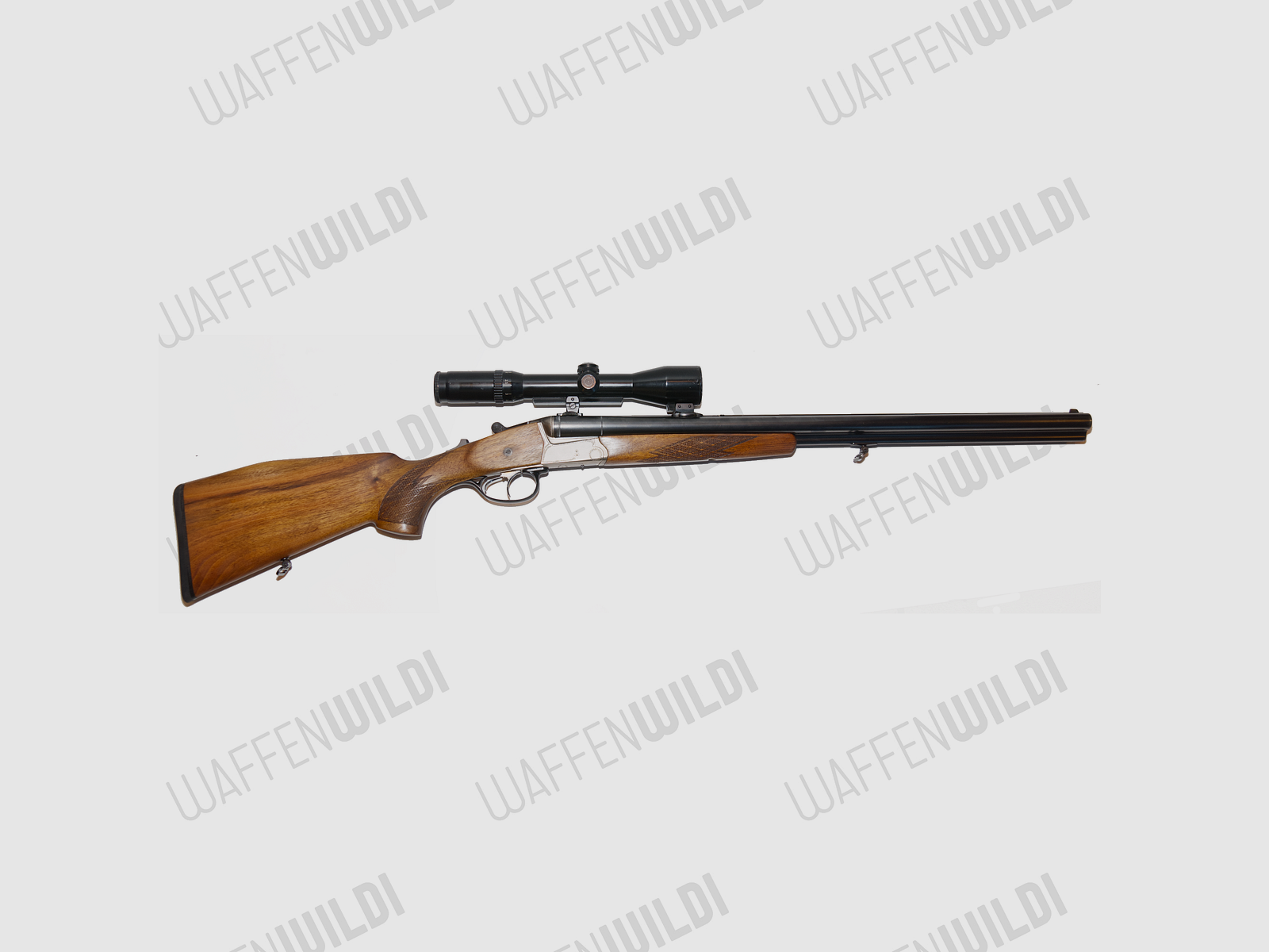Krieghoff Trumpf drilling 12/70 – 12/70 – 7x65R avec lunette Schmidt & Bender