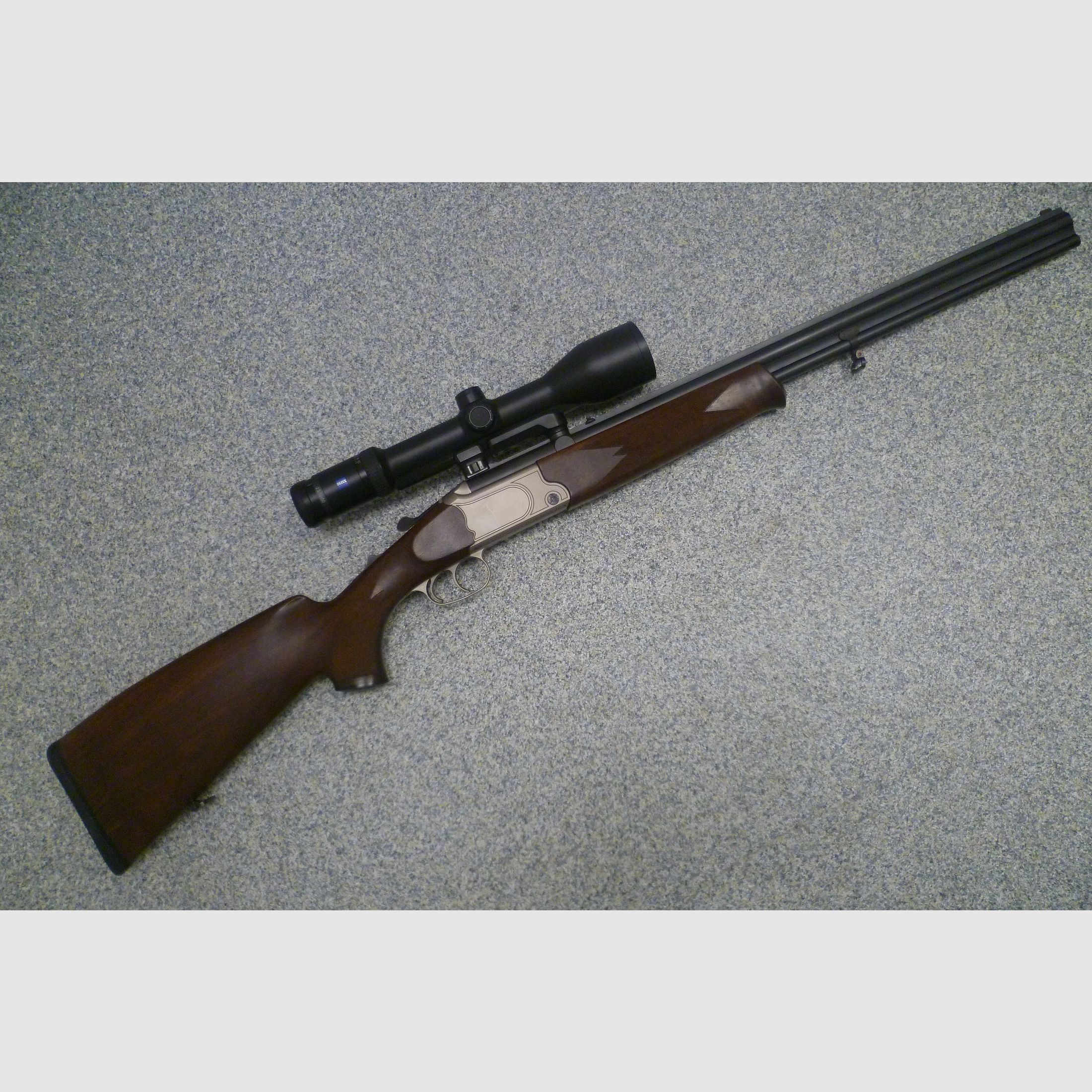 Escopeta de doble cañón Simson 20/76 y .30R Blaser con Zeiss Victoty HT