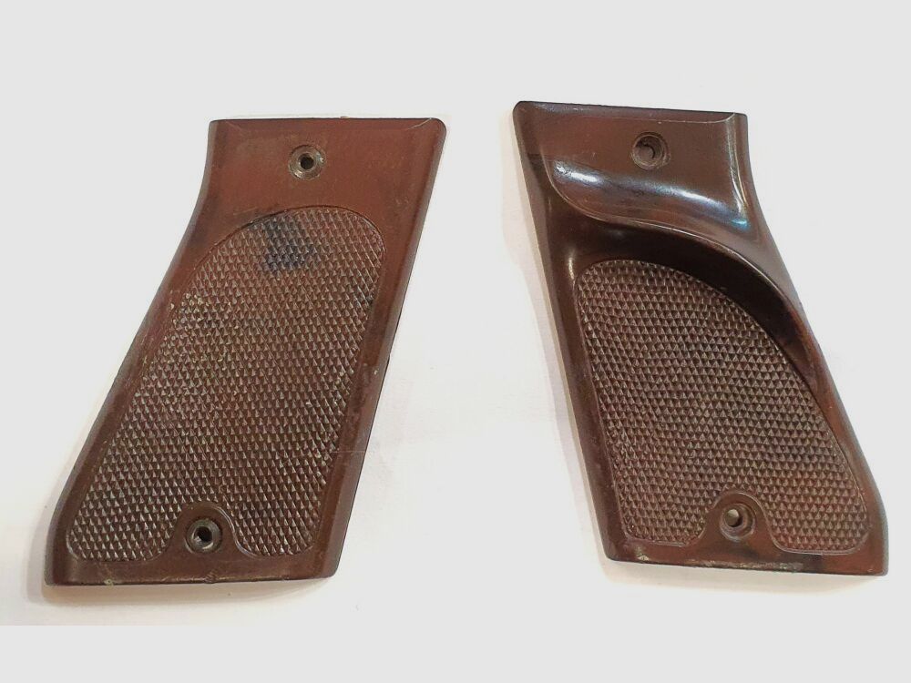 Unknown pair of grip panels with thumb rest unknown