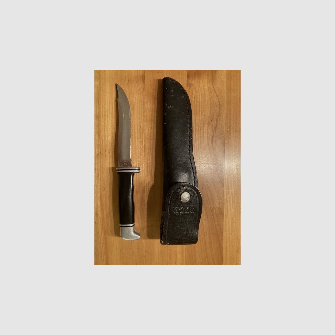 Buck 105 knife with original leather sheath