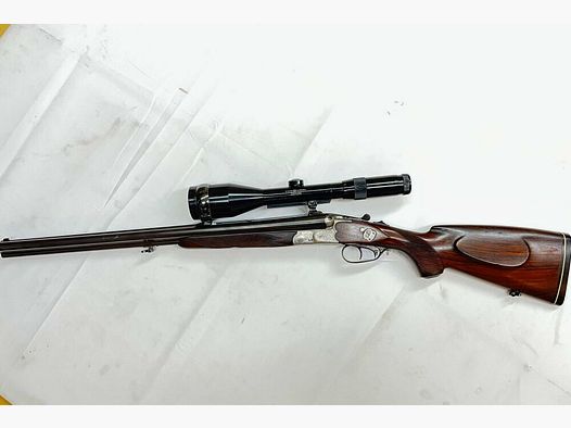 Sauer & Sohn Drilling Cal. 8x57 IRS, 16/70 canna intercambiabile .22 Hornet