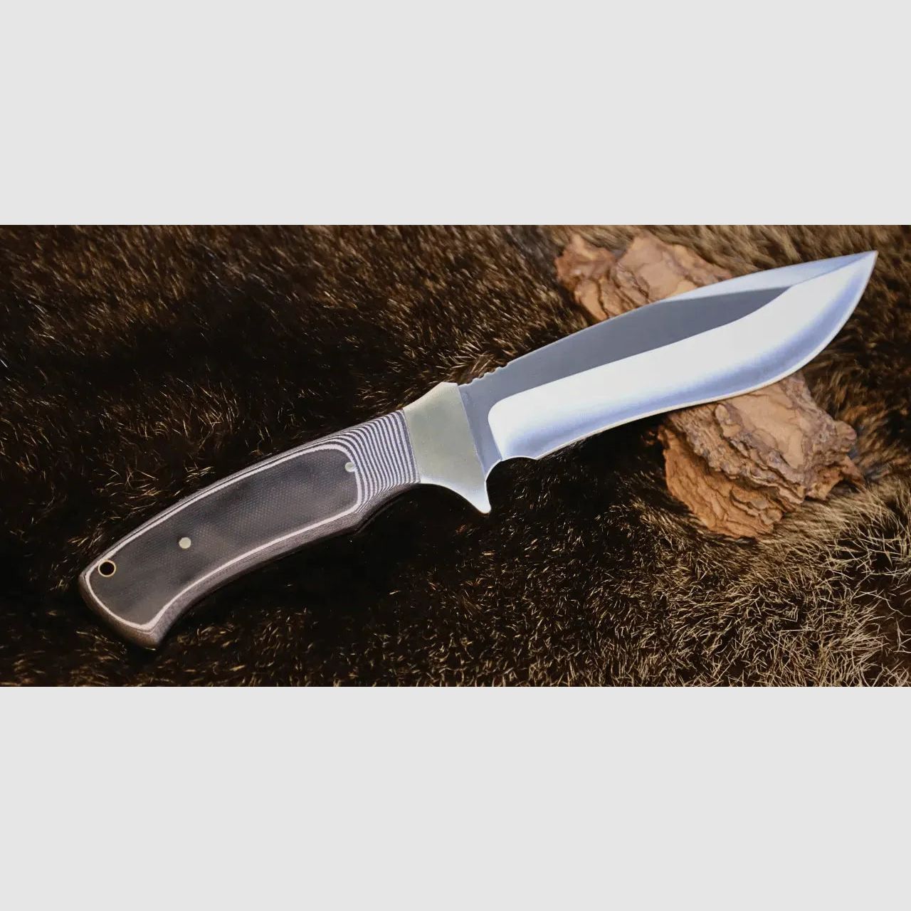 PUMA XP nomad z zapalnikiem, G10 czarny