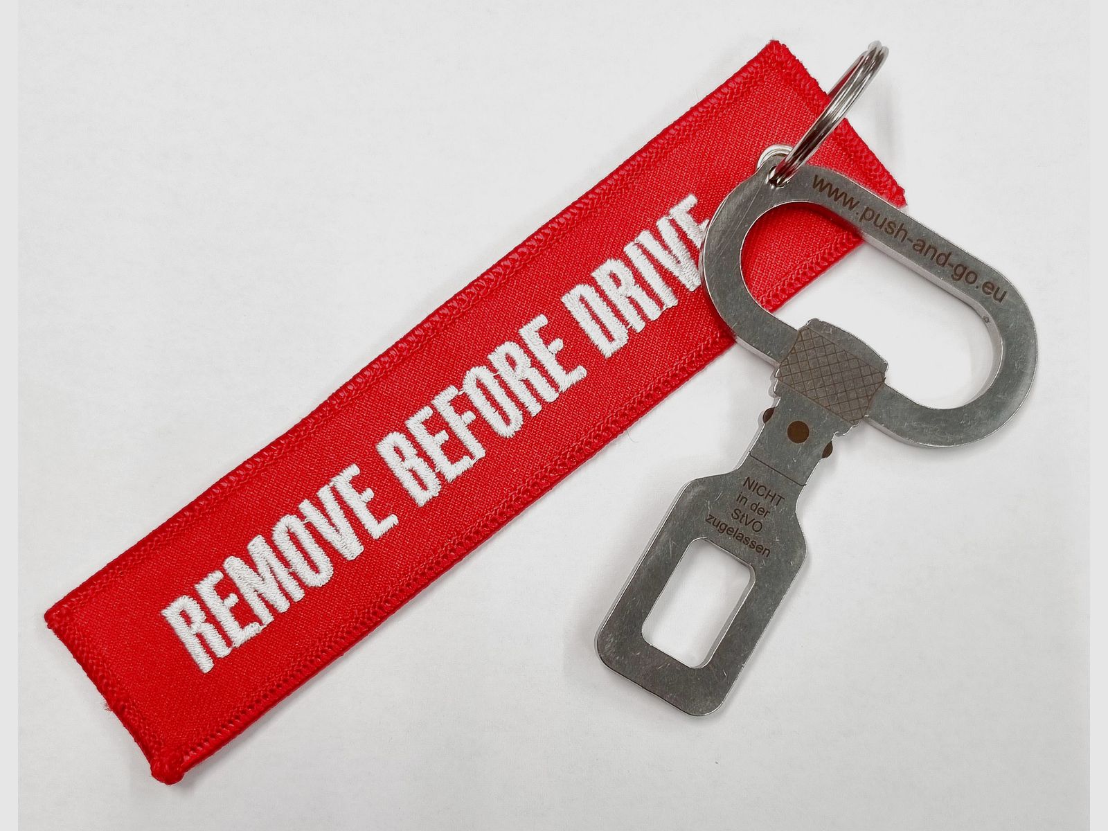 Halder-Druckknopfriemenbügel Gurtalarmstopper mit Warnfahne Jagd