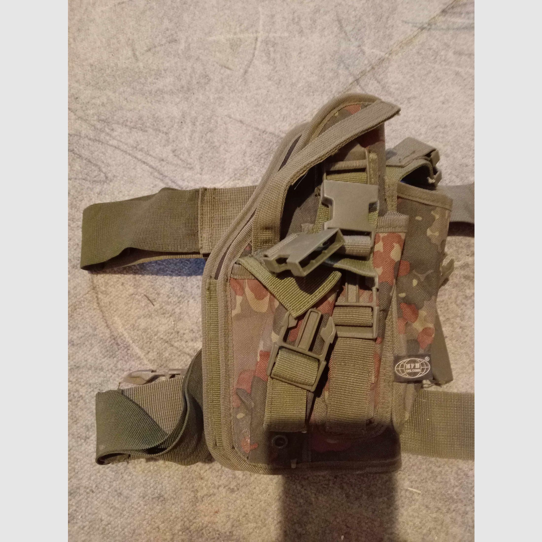 Pistol holster   Thigh holster