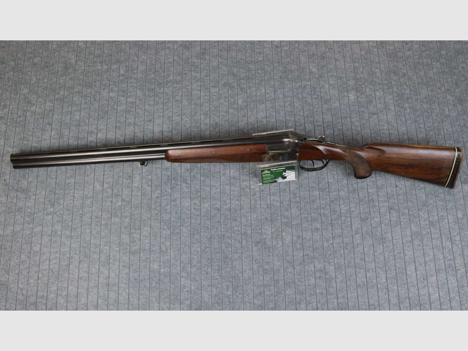 Merkel over-and-under shotgun 12/70