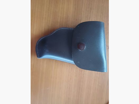 Pistol holster for 6.35mm Browning or blank firing pistol