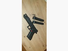 Glock 17 9mm, with accessories and subtle tuning