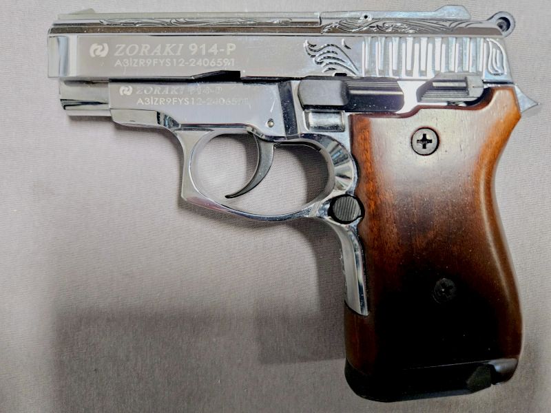 Zoraki 914-P 2024 pistola de fogueo 9mm P.A.K. cromado grabado aspecto madera (PTB 1070) - 914 como nueva!