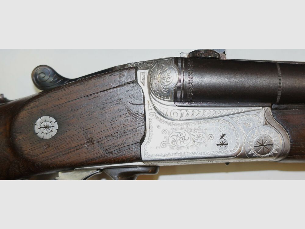 Krieghoff Drilling, Krieghoff, Kal.7x57R / Kal.16/70, mit GECO Zielfernrohr und schönen Gravuren