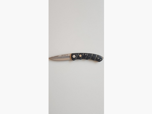 Puma IP climbing micarta