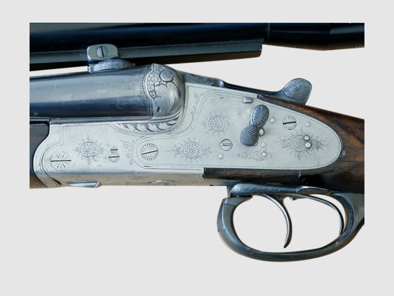 Suhl double-barreled drilling caliber 2x8x60R and 12/70 with interchangeable barrel caliber 2x12/70, 8x60R and ZF, additional