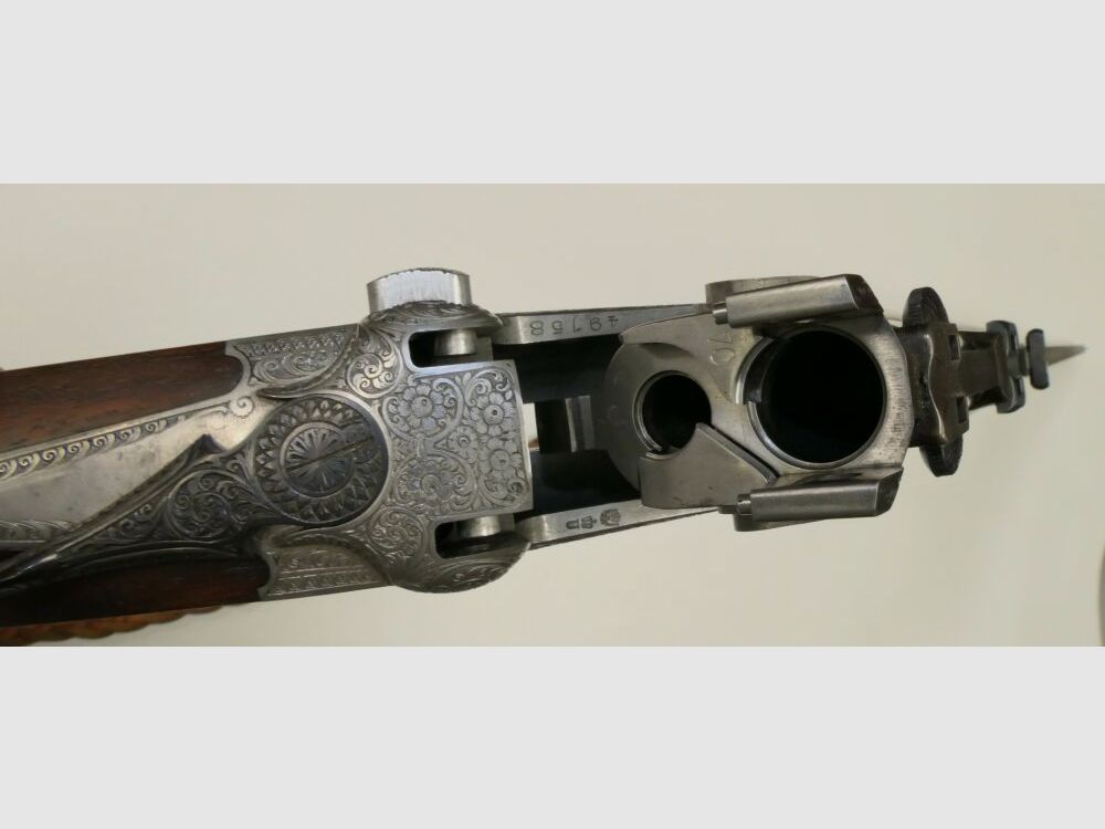 Merkel E313 mit jagdlichen Tiergravuren