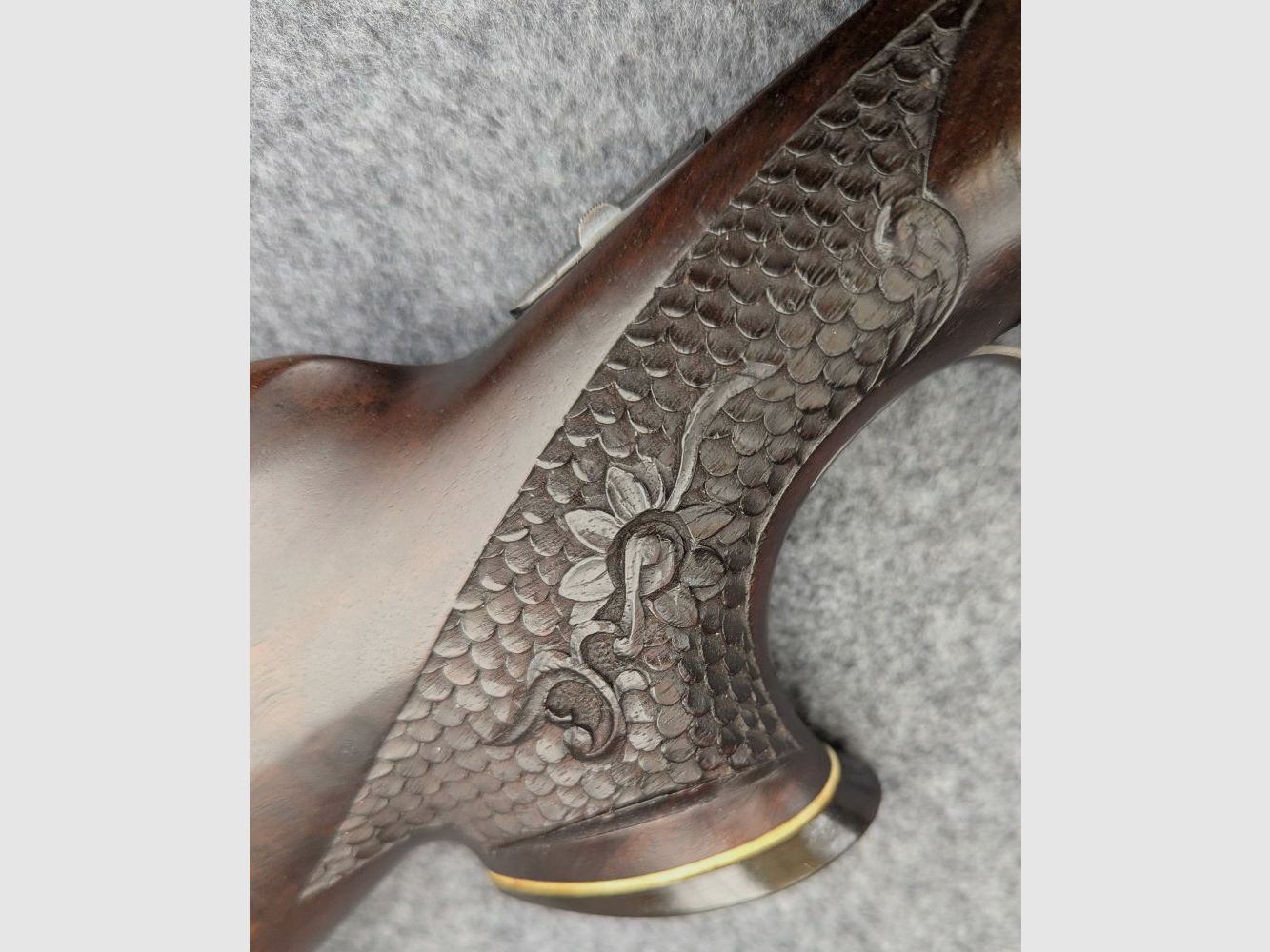 Mauser Mod 98 with animal engraving and stalking safety