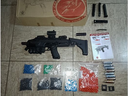 RAM Cal .43 Combat (Glock) + 4 Magazine + Aps Caribe Action Conversion Kit T1-Socom Visier und Zubehör Co2 Fastballs + Paintballs