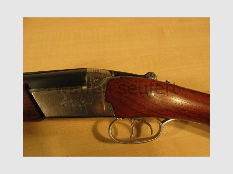 Toz 34EP over-and-under shotgun with ejector