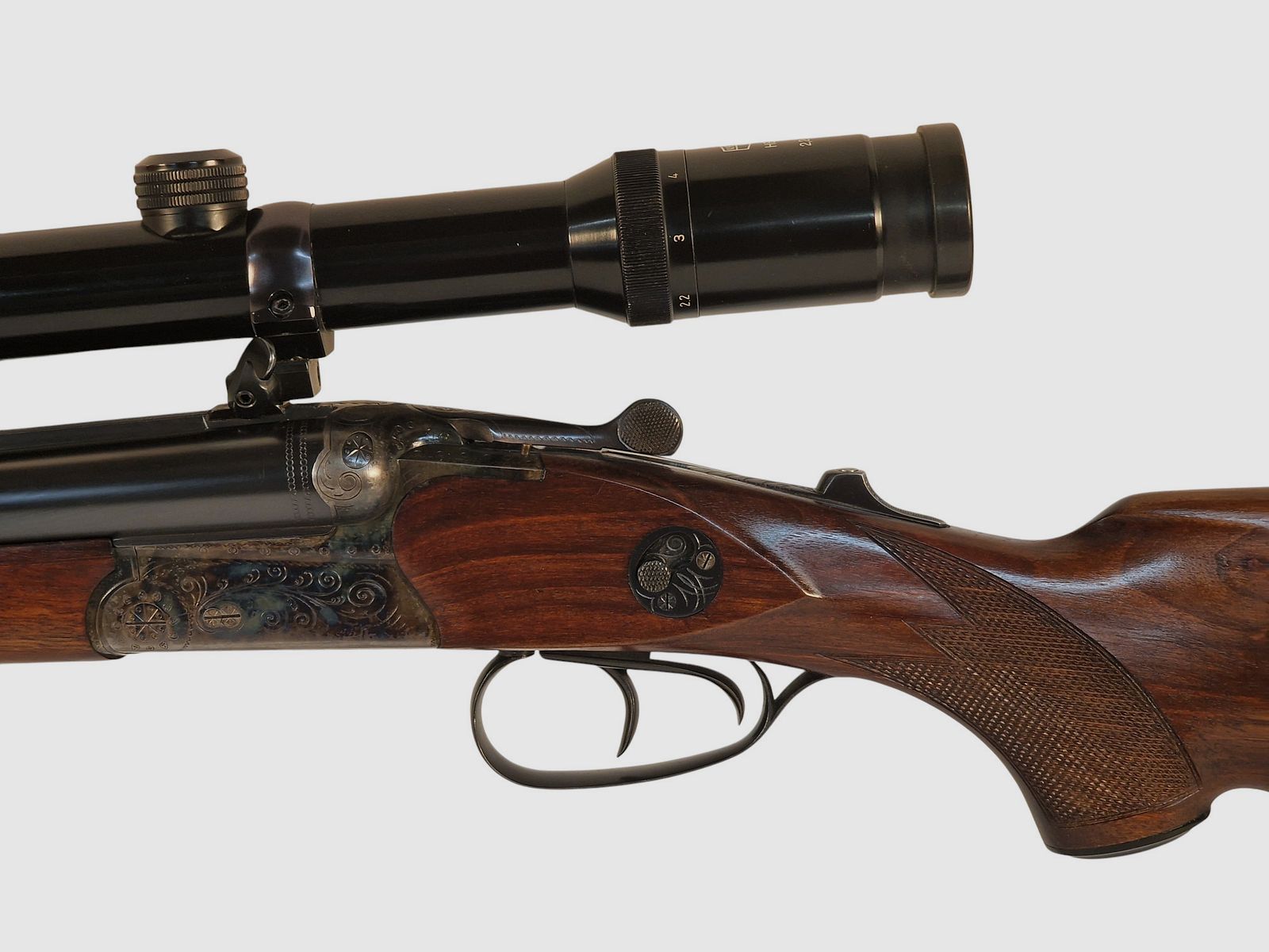 Suhler drilling hardened in caliber .30-06 16/70 22 WinMag with Kahles 2.2-9x42