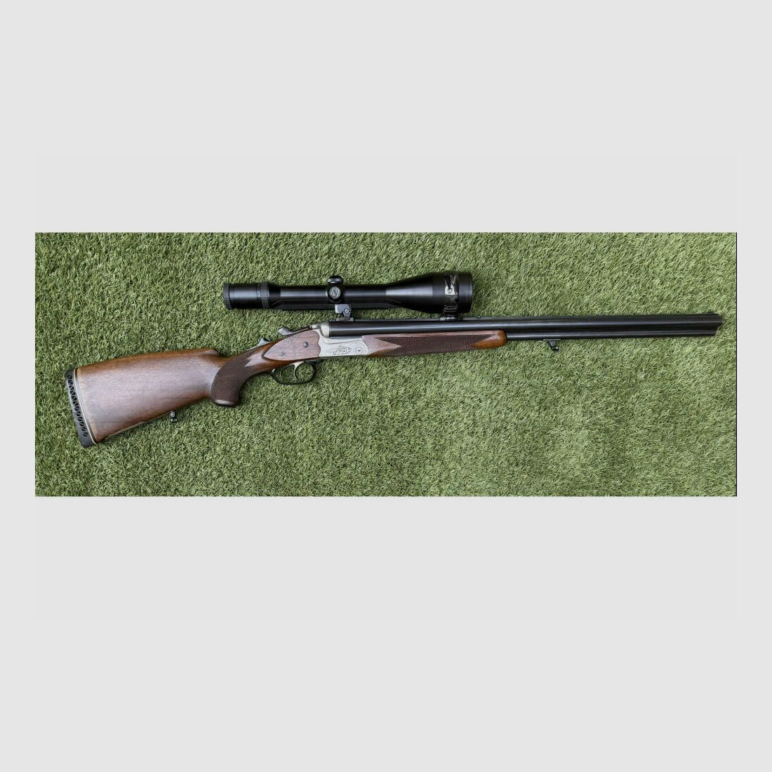 Heym Drilling mit Zeiss 3-12x56 und Einstecklauf .22Hornet 20/76;9,3x74R