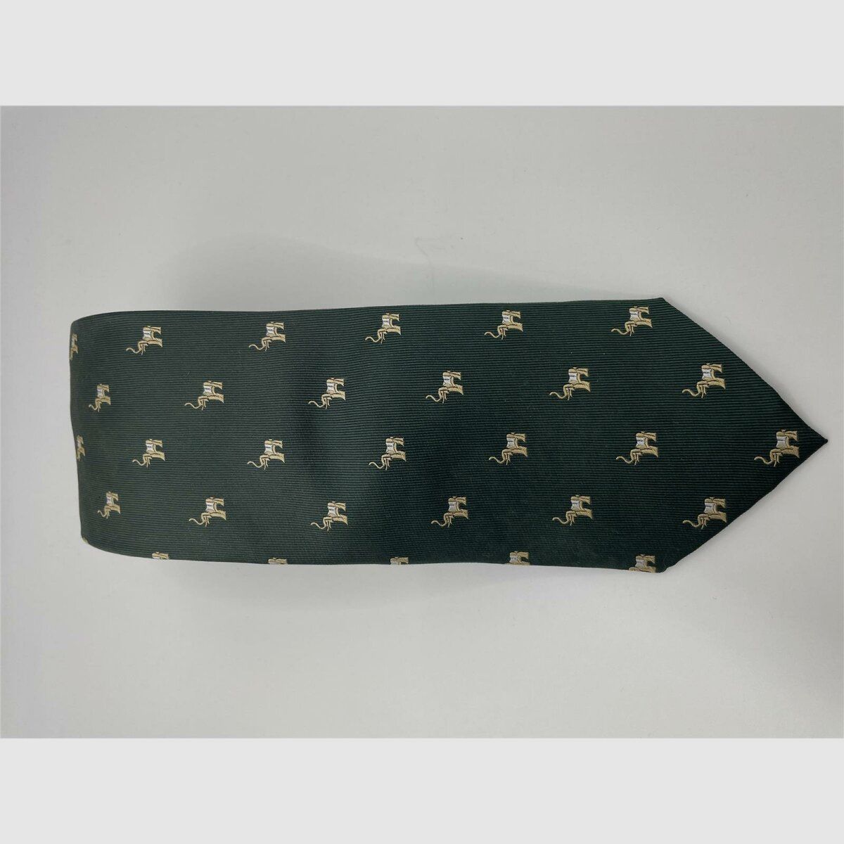 Cravatta verde scuro motivo elefante beige