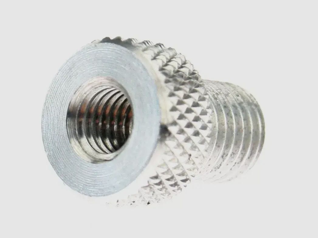 Adaptador para el cepillo de limpieza de escopetas