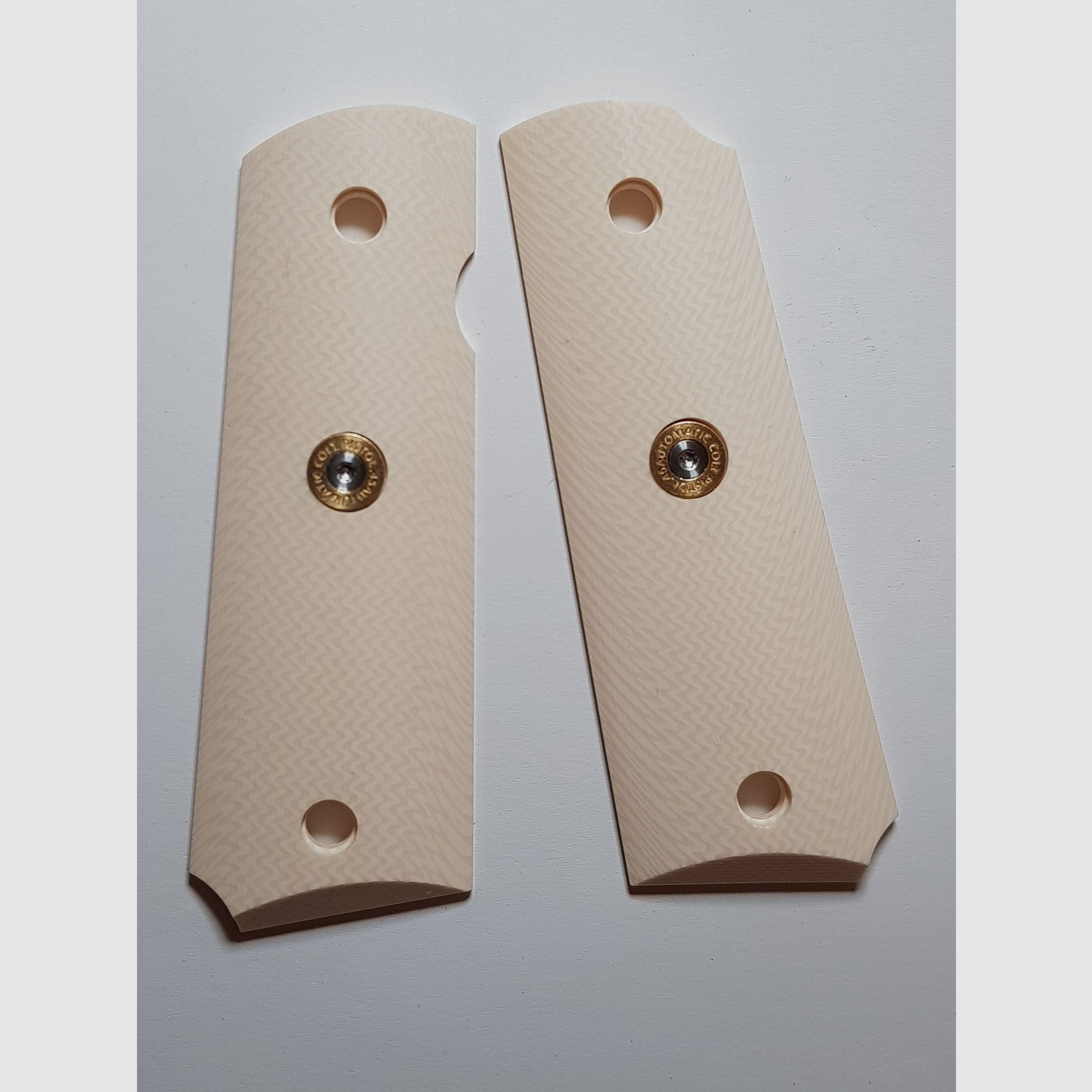 Grips of the Colt 1911 P.A.K