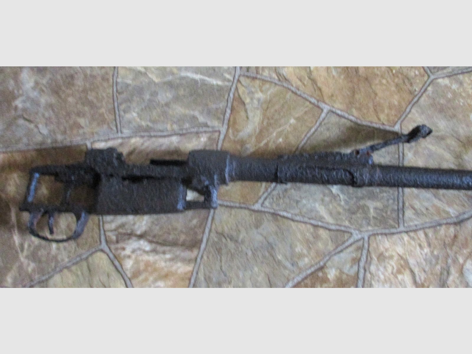 old rifle from World War I or II, decorative barn find