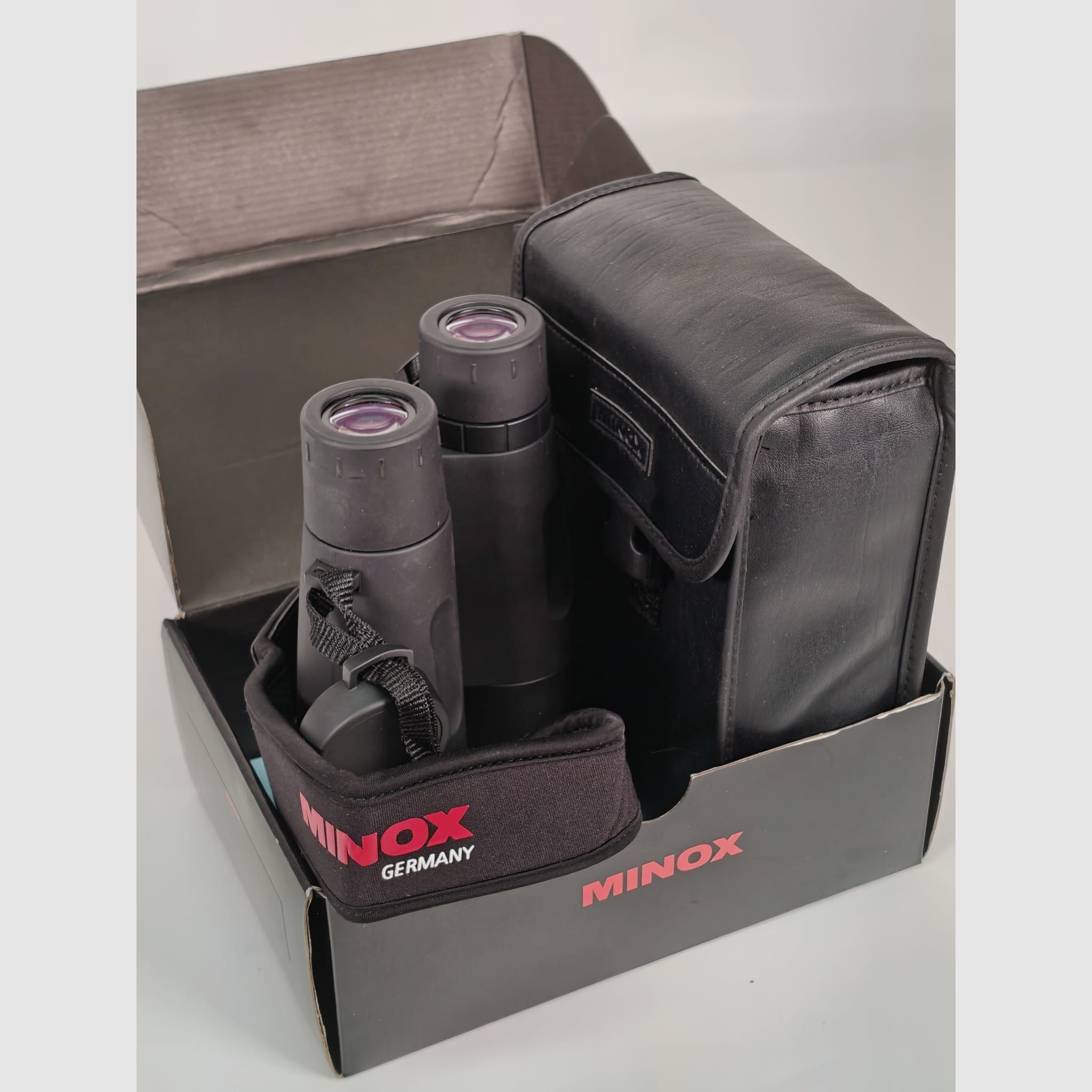 Minox BD 10x58 ED inkl. Riemen und Tasche