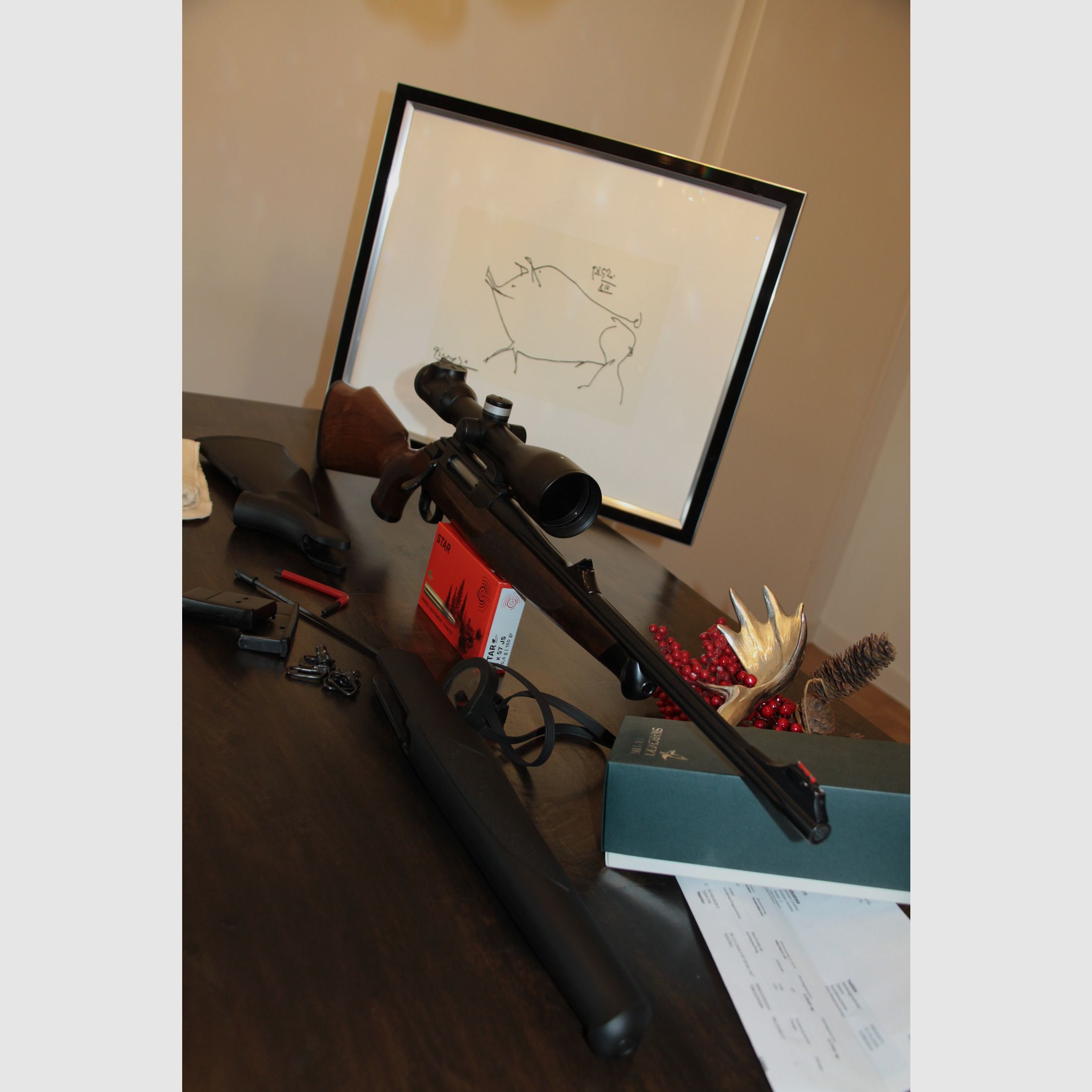 Sauer 202 with two stock sets in 8x57iS including Swarovski z6i 2.5-15x56