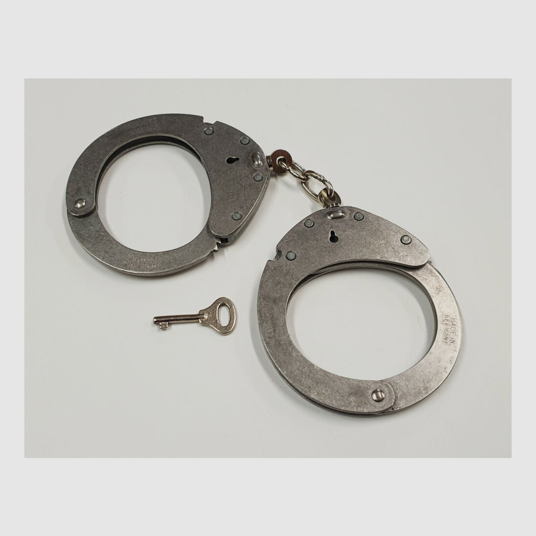 CLEJUSO Clemen & Jung e.K. Handcuff CLEJUSO No. 12 INOX, stainless steel handcuff, made in Germany, used