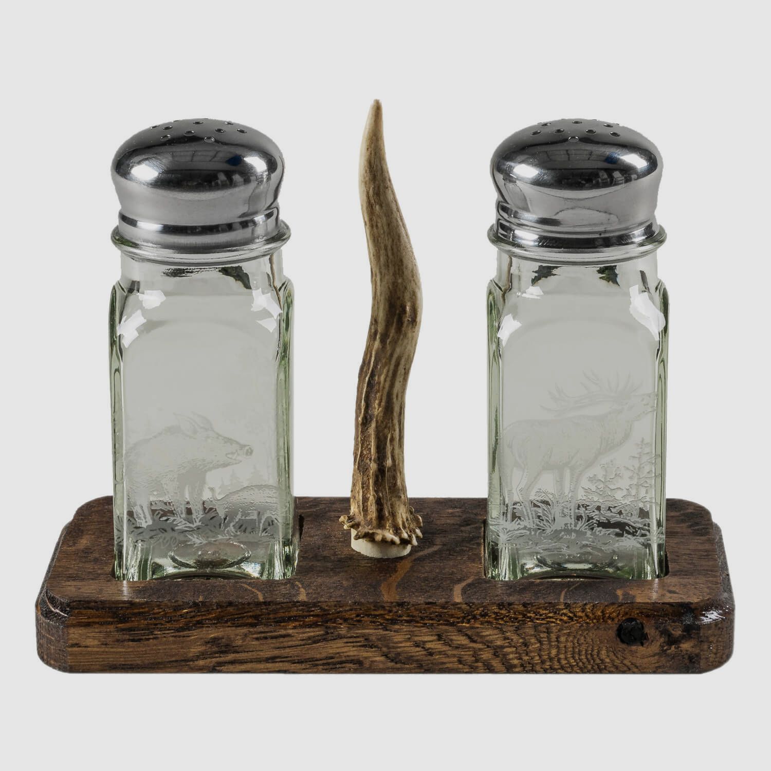 Salt & pepper shaker on oak board with deer stick