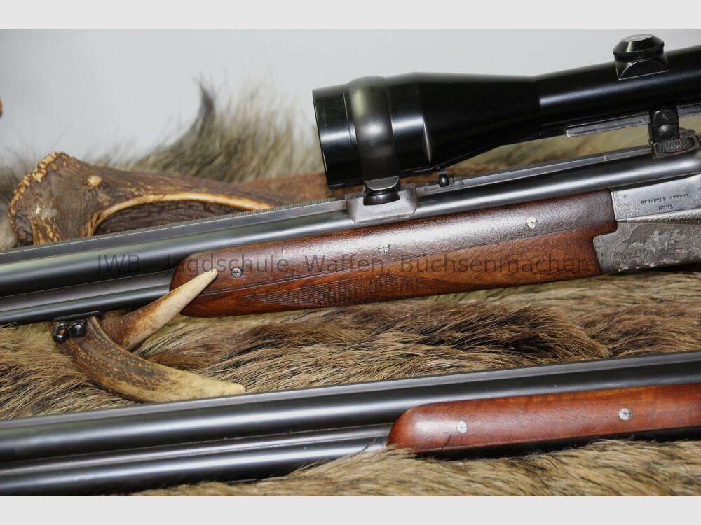 Merkel double-barreled shotgun with interchangeable double-barrel and variable sight 12/70; 7x57R