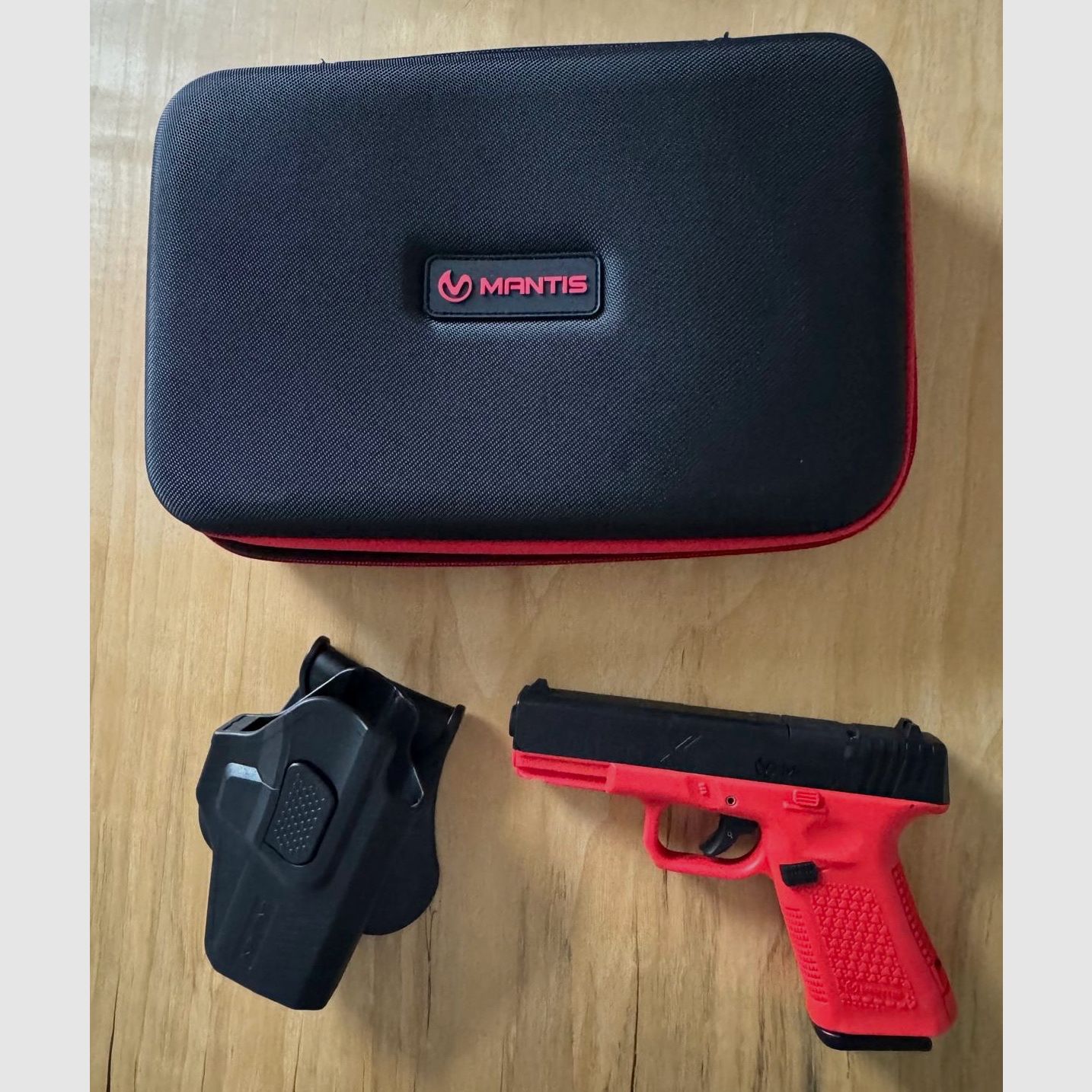 Mantis Titan X 701 laser dry-fire training pistol (like Glock 19)