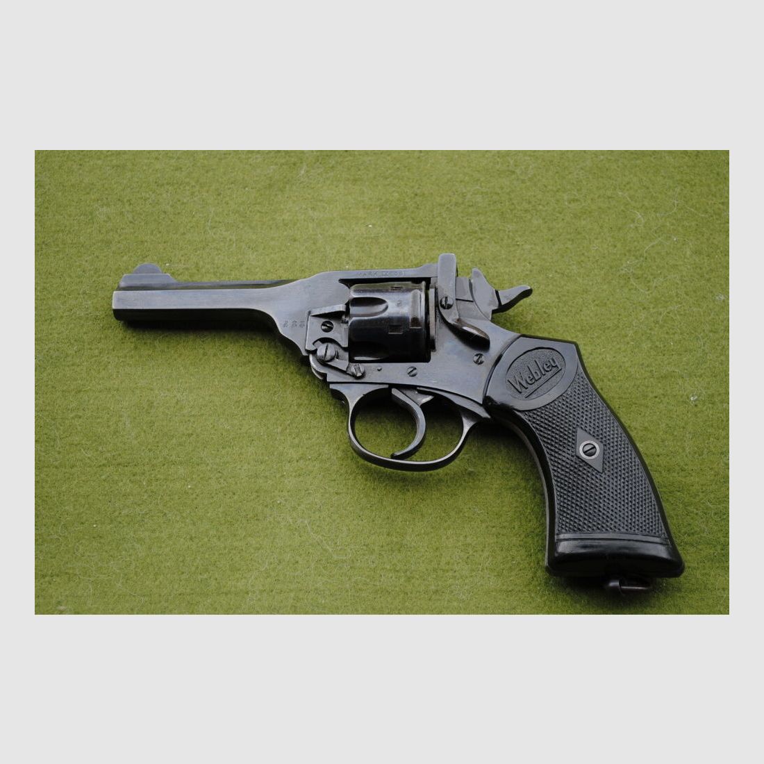 Webley MARK IV, various British stamps