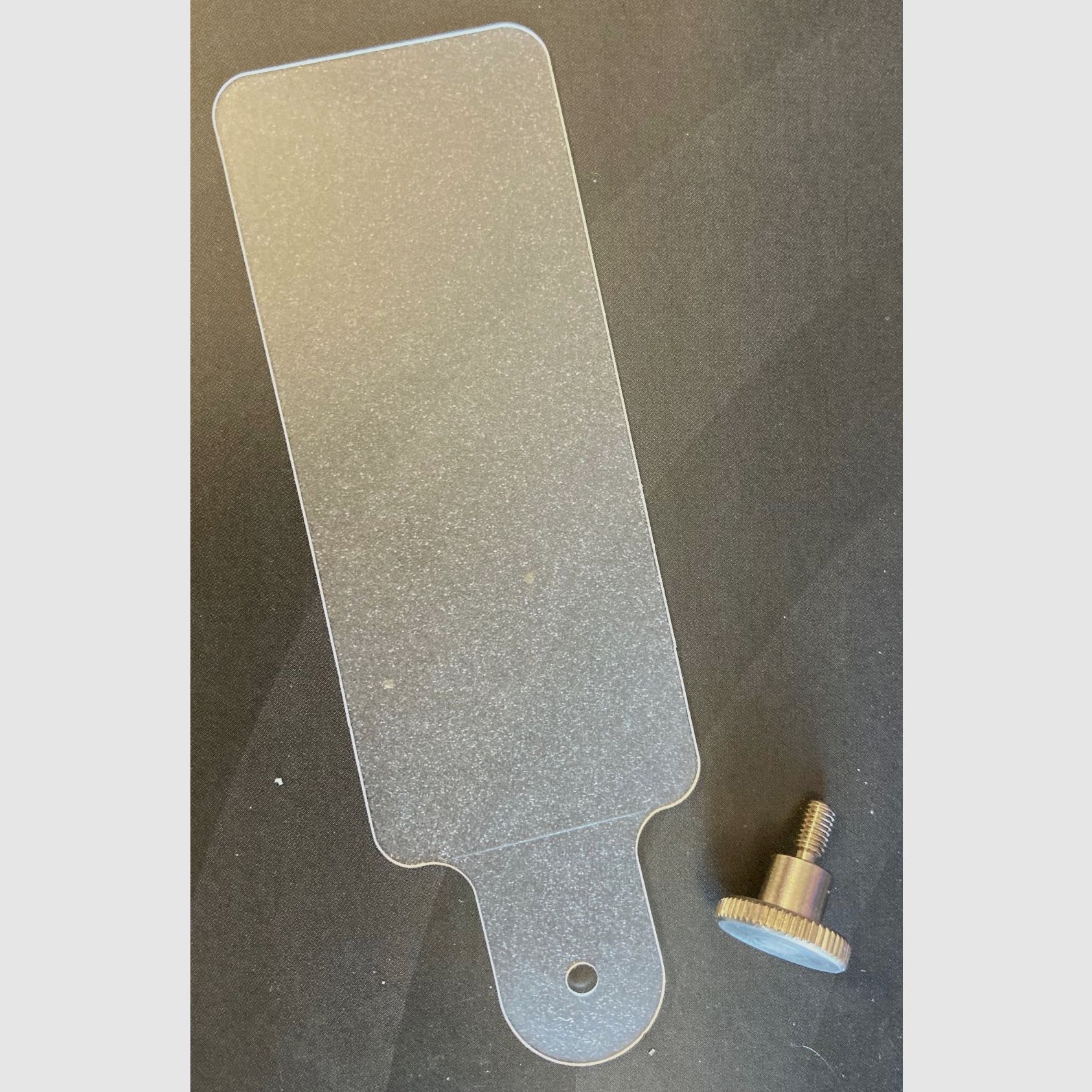 Abdeckscheibe mit Schraube