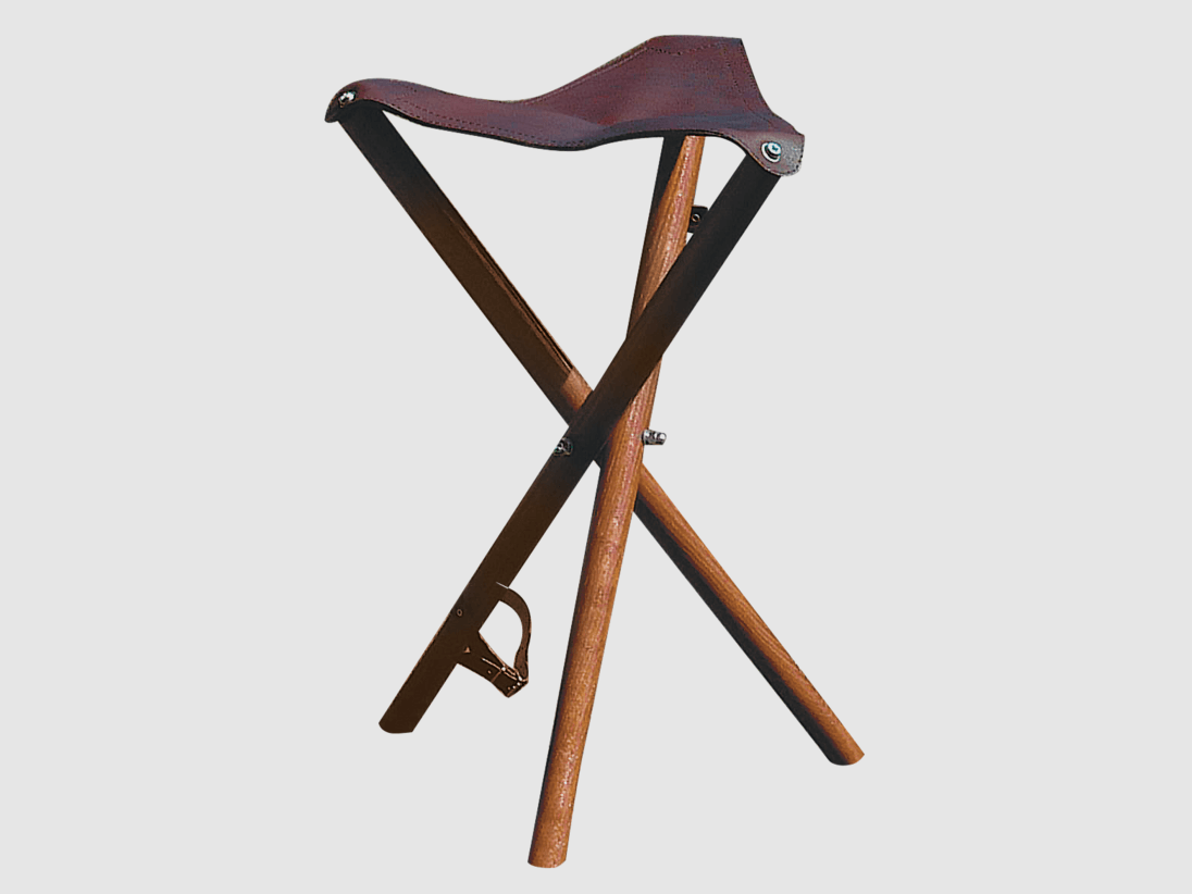 Three-legged compact with leather seat surface