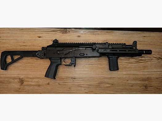 Tokyo Marui AKX / 1x magazine / Reptilia pistol grip / charging handle