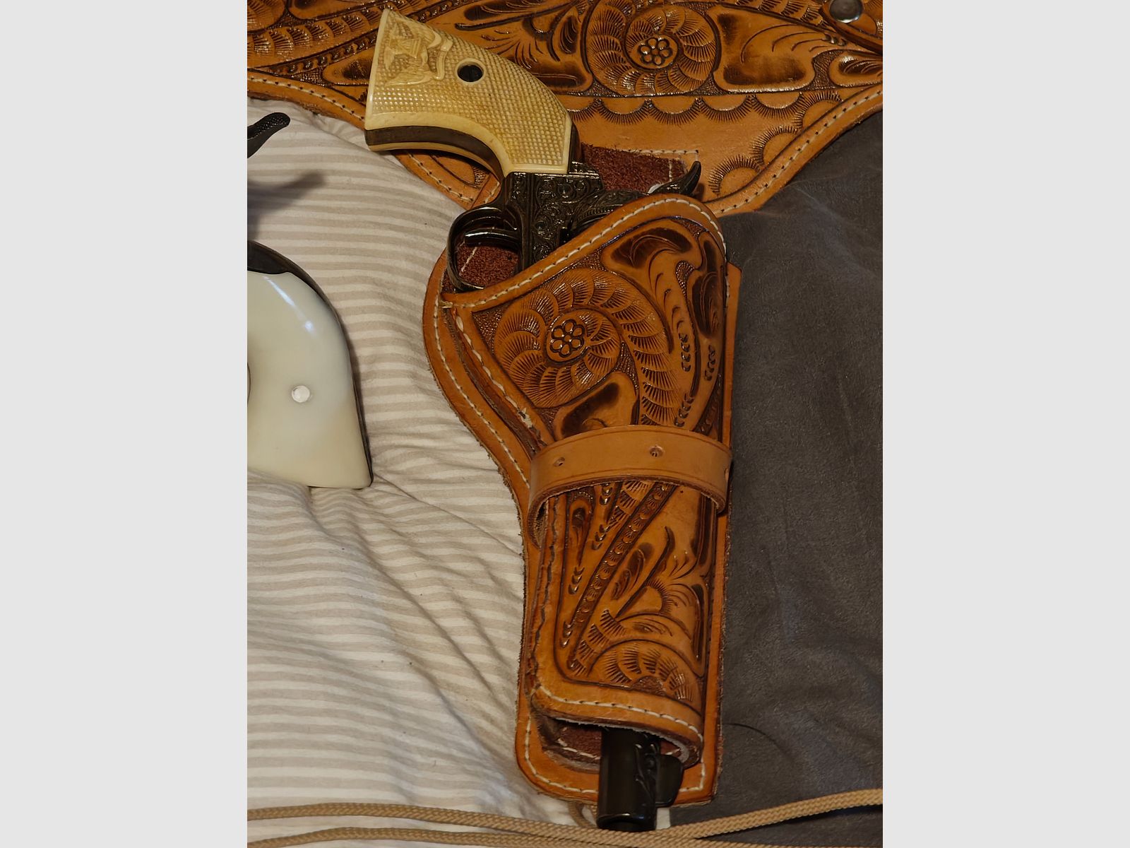 Weihrauch Western Single Action (SAA) revolver with the PTB 788 with white grip panels