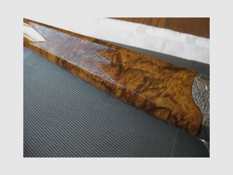 Absolutely UNIQUE COLLECTOR'S ITEM = Almost like new "Custom STEEL SYSTEM completion" with HAND-MODELED FULL ENGRAVINGS for R93, with custom-made right-handed semiweight stock and Category-11!! System is still one WITHOUT serial number!! Includes Blaser leather rifle sling!, image 4 of 17