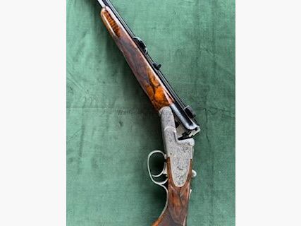 Goat cock side lock break-action rifle