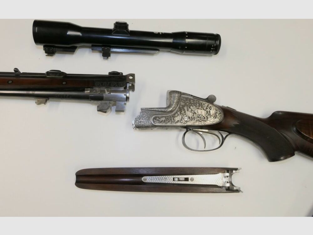 Merkel E313 mit jagdlichen Tiergravuren