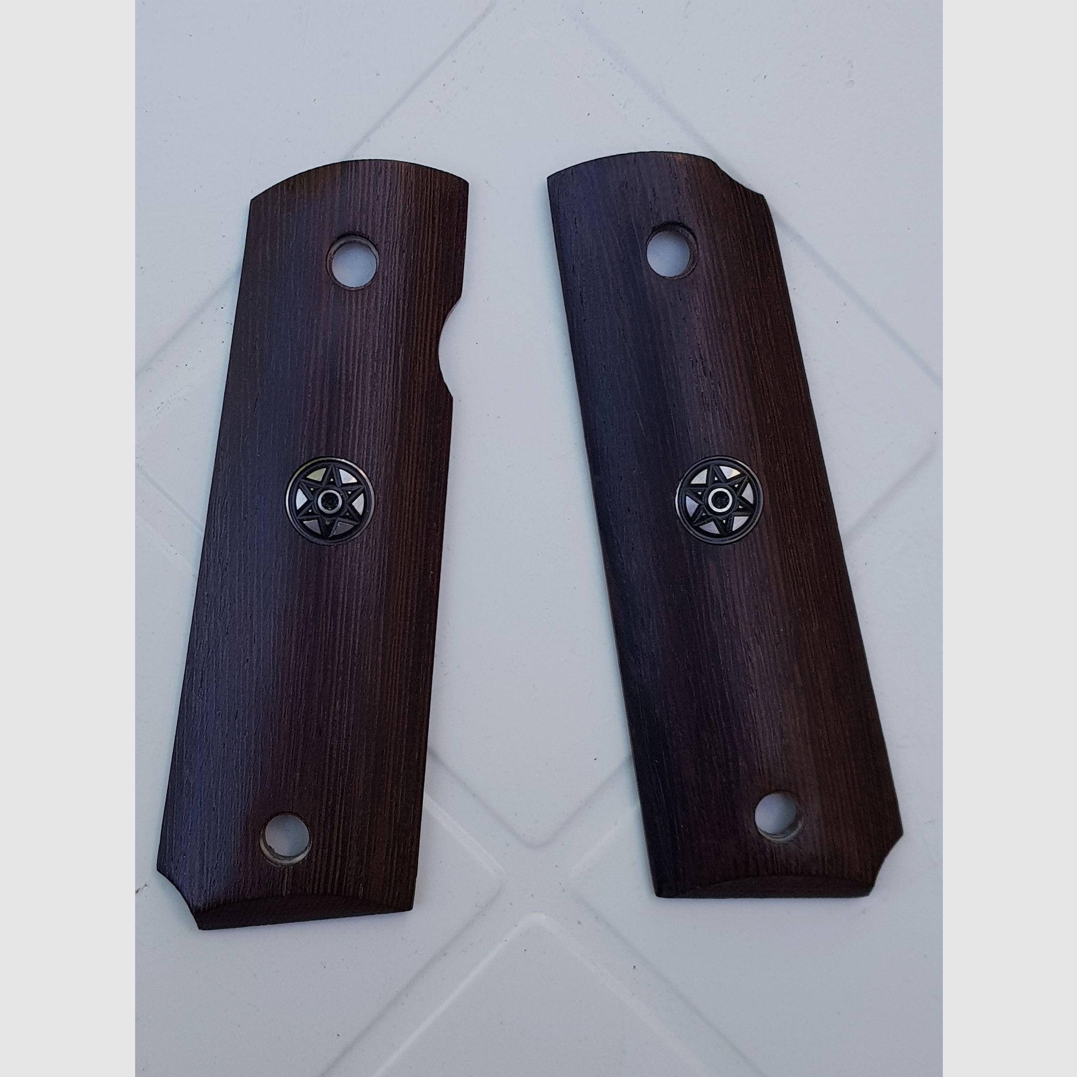 Grips of the Colt 1911 P.A.K