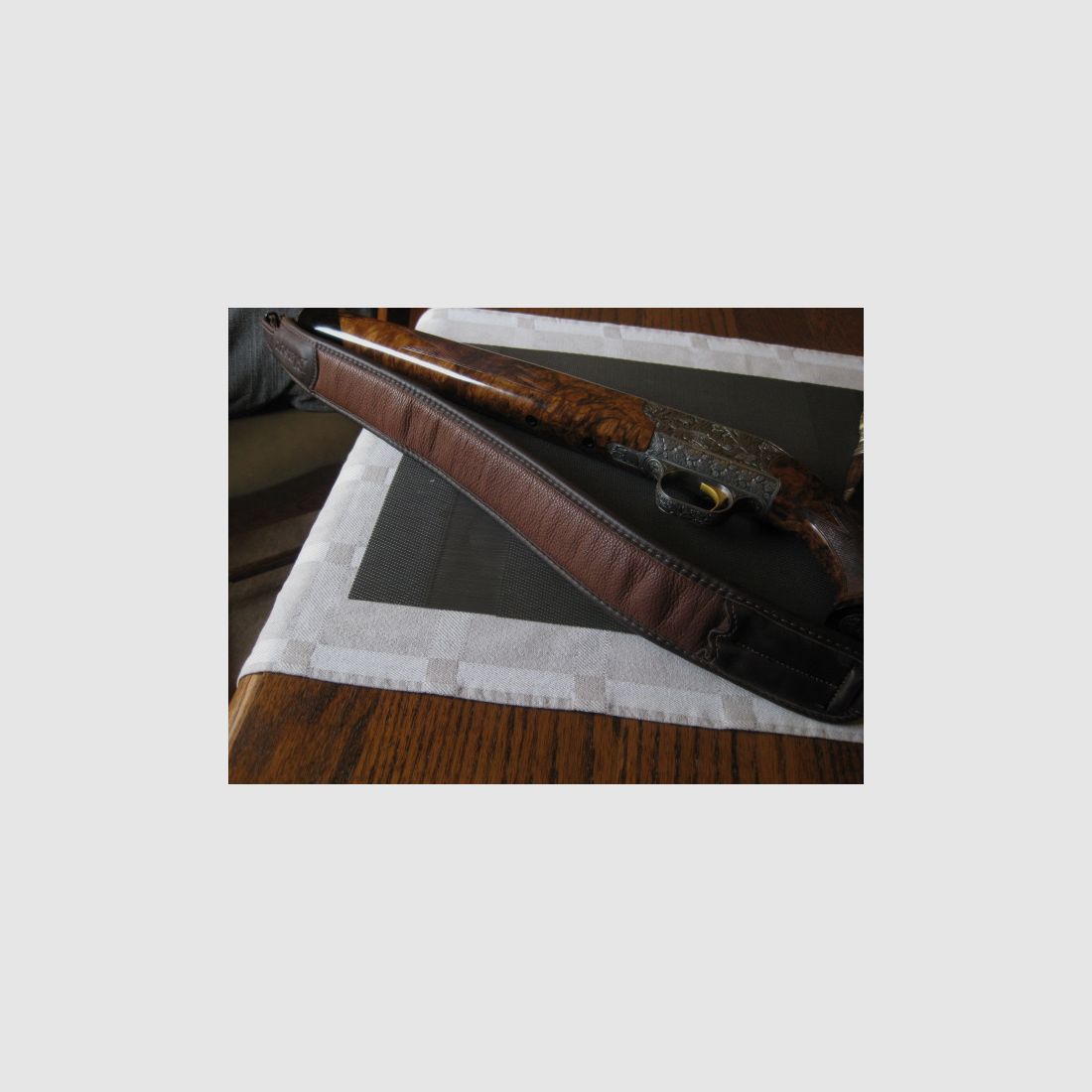Absolutely UNIQUE COLLECTOR'S ITEM = Almost like new "Custom STEEL SYSTEM completion" with HAND-MODELED FULL ENGRAVINGS for R93, with custom-made right-handed semiweight stock and Category-11!! System is still one WITHOUT serial number!! Includes Blaser leather rifle sling!, image 1 of 17